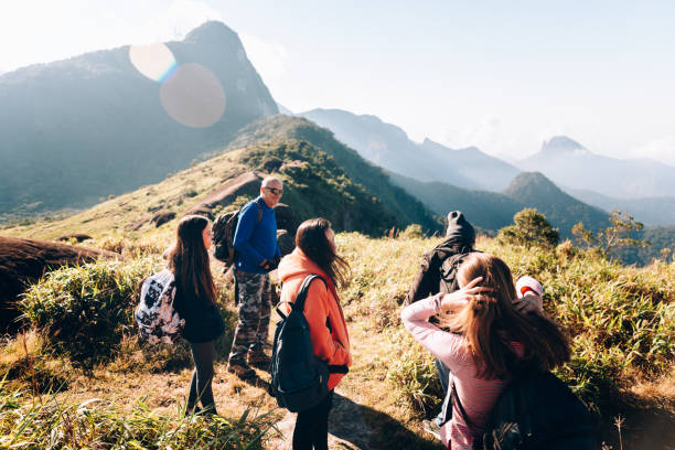 istock Group of people hiking on the mountains 1169872592