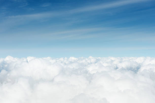 istock above the cumuls clouds, blue sky background 1169872842