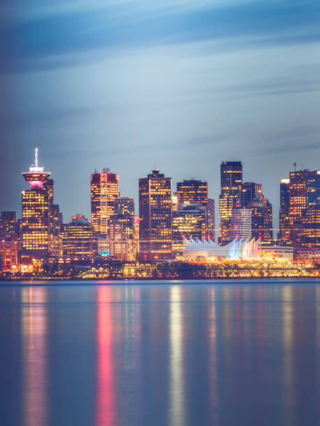 Canada, British Columbia, Vancouver, Convention Center and Canada Place Canada, British Columbia, Vancouver, Convention Center and Canada Place. vancouver at night stock pictures, royalty-free photos & images