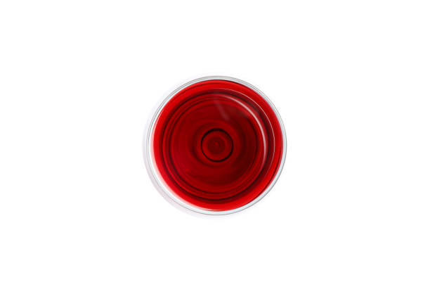 istock Glass with red wine isolated on white background, top view 1169874420