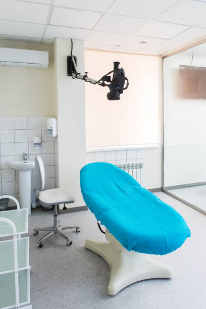istock Medical chair and video camera 1169874448