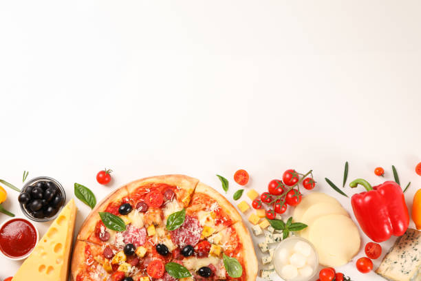istock Flat lay. Pizza and ingredients: vegetables, cheese on white background, copy space 1169875609