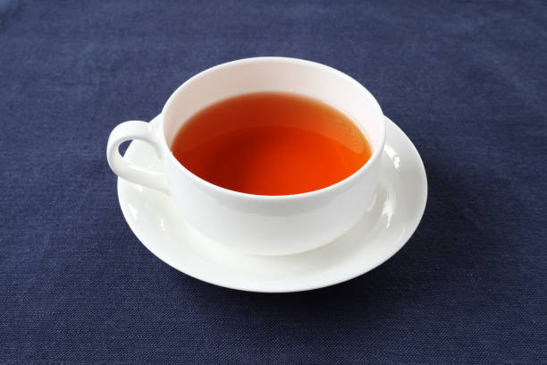 istock cup of tea isolated on table cloth 1169875694