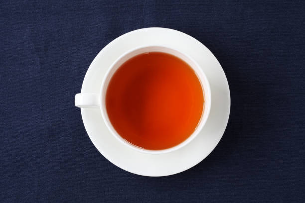 istock cup of tea isolated on table cloth 1169875789