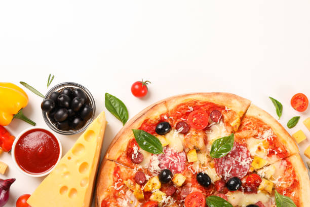 istock Flat lay. Pizza and ingredients: vegetables, cheese on white background, copy space 1169875854