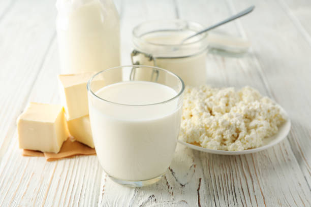 istock Different dairy products on white wooden background, space for text 1169876668