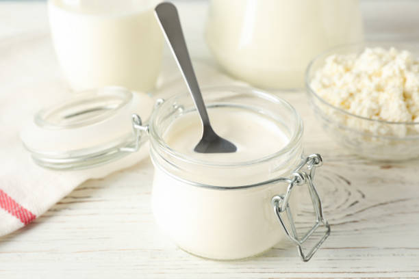 istock Different dairy products on white wooden background, close up 1169876760