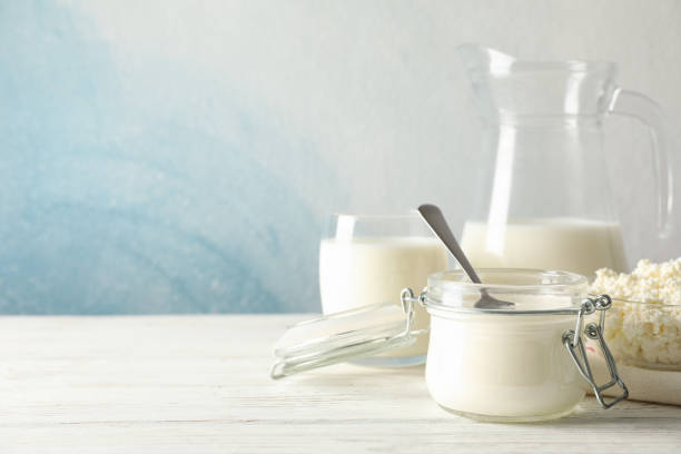 istock Different dairy products on white wooden background, copy space 1169876798