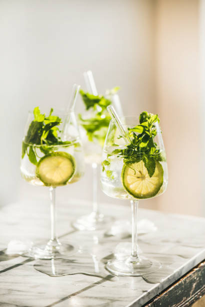 istock Hugo Sparkling wine cocktail with eco-friendly straws over marble counter 1169876821