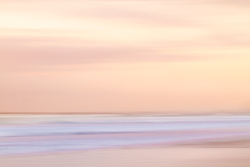 Abstract sunset sky and ocean background with blurred motion