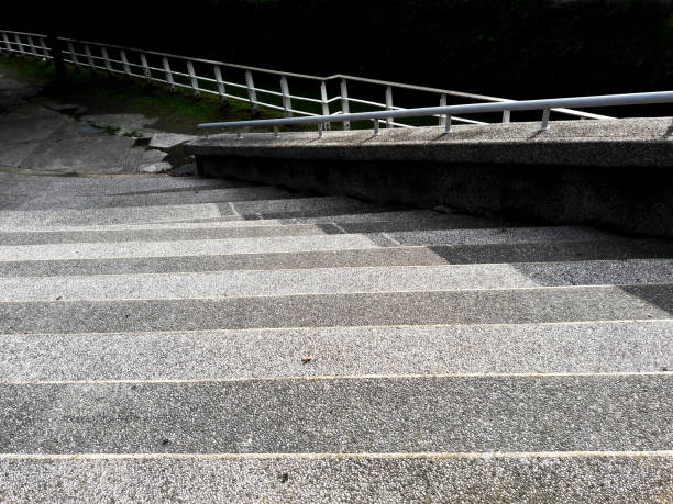 istock Abstract cement or concrete texture of stairs or steps. Diagonal stripes or lines pattern for background. 1169877046