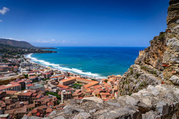 View from Rocca di Cefalu Stunning view of the colourful ocean from the Rocca di Cefalu in Sicily (Italy) cefalu stock pictures, royalty-free photos & images