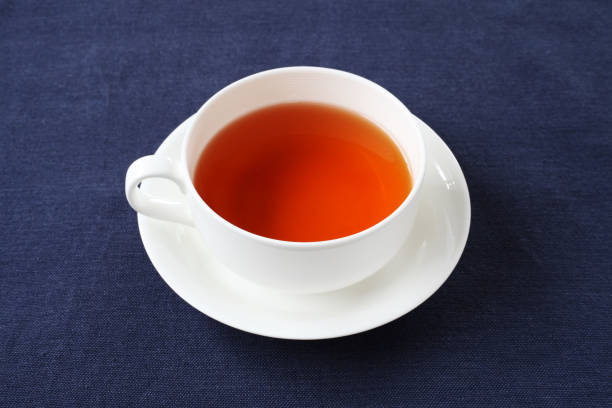 istock cup of tea isolated on table cloth 1169880025