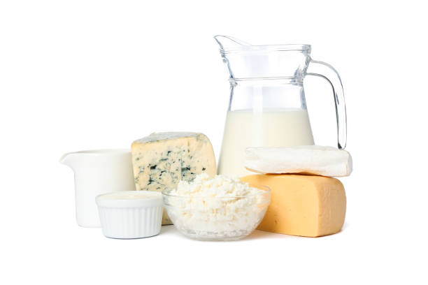 istock Different types of cheese and milk isolated on white background 1169880094
