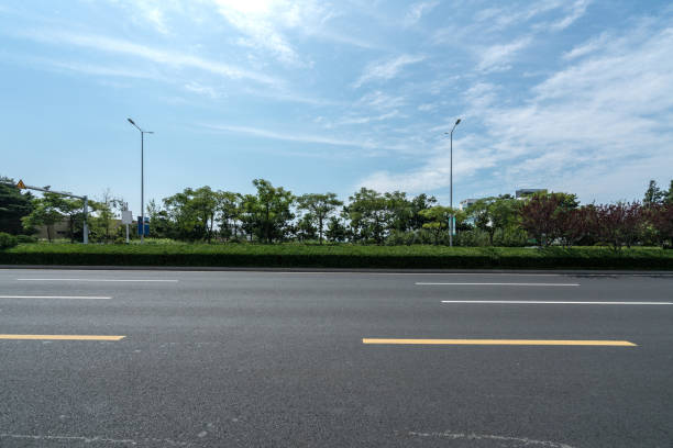 istock Luxuriant trees and roads in Qingdao, China 1169887204