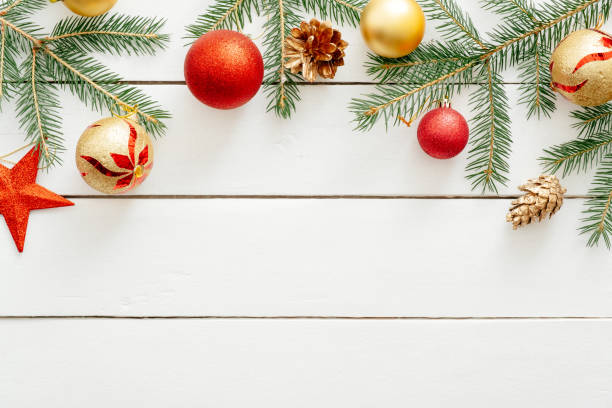 istock Christmas composition. Christmas frame with fir tree branches, pine cones, Christmas decorations, red balls. Flat lay, top view, copyspace 1169887208