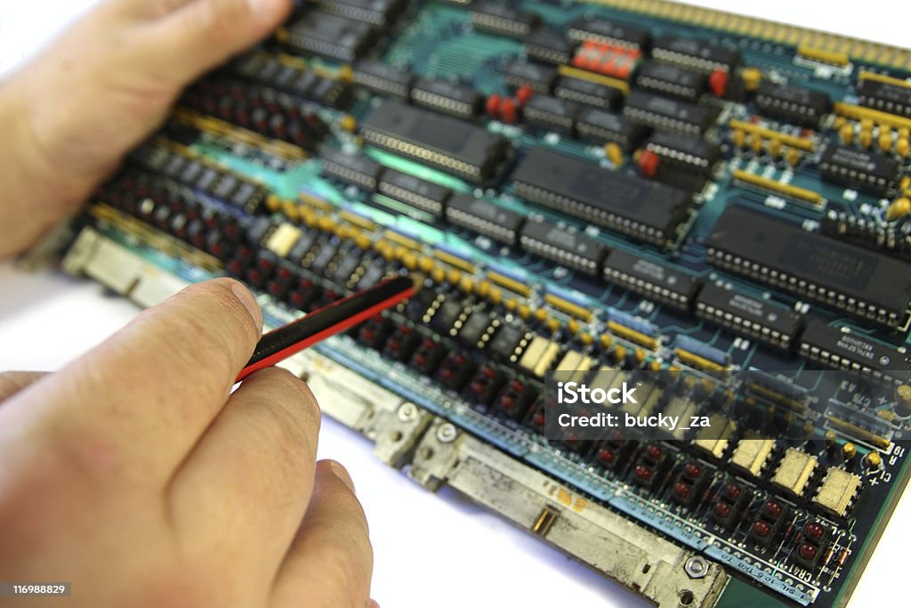 Electronic Engineer Examining A Microprocessor Circuit Board Stock ...