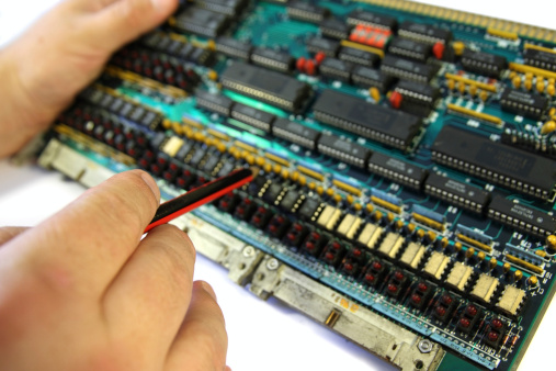 Electronic Engineer Examining A Microprocessor Circuit Board Stock ...