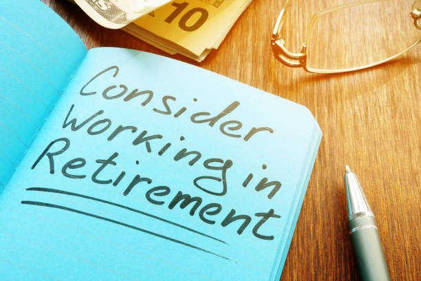 istock Consider working in retirement sign with pen and glasses. 1169888563