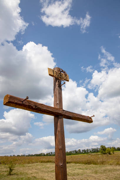 istock Wood cross on blue sky 1169889193