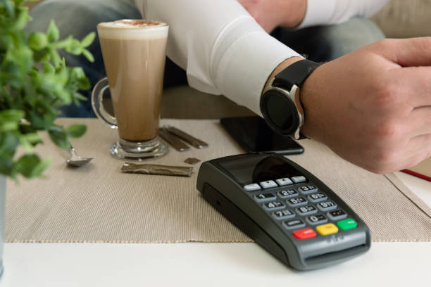 istock Customer making wireless or contactless payment using smartwatch, nfc payment 1169890313