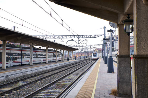 view of a train entering a small train station