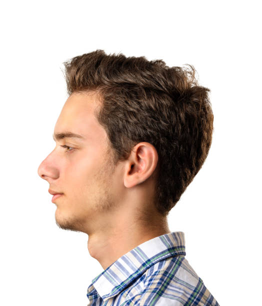 istock Profile view of young man isolated on white background 1169894248