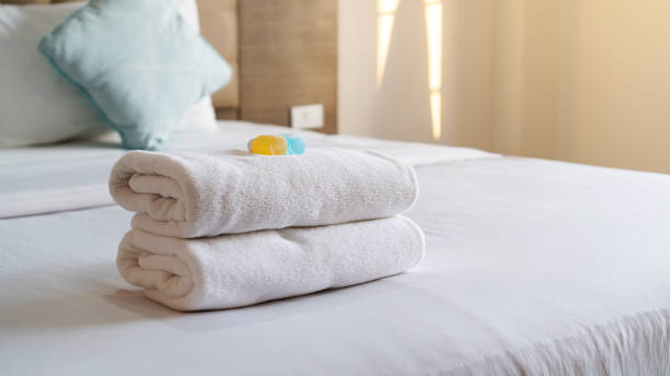 istock White towel shampoo and soap on a bed. 1169896157