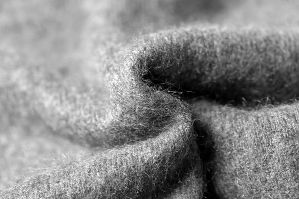 grau gestrickte wolle hintergrund - cashmere texture stock-fotos und bilder