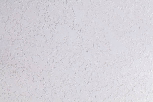 istock Abstract grunge decorative white light stucco wall background 1169902401