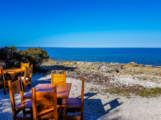 istock Rovinj - Little restaurant by the sea shore 1169904100