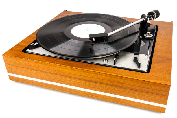 istock Vintage turntable vinyl record player isolated on white 1169906265