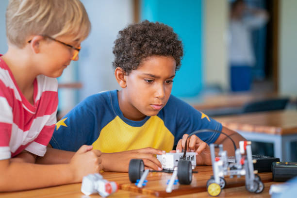 istock Schoolboys researching on STEM project in school 1169906652