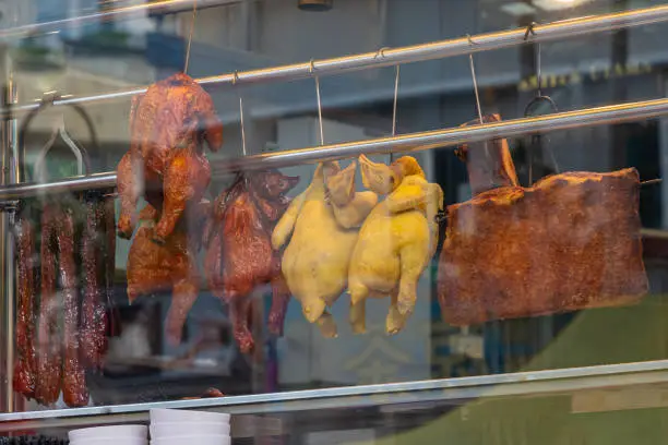 Photo of Cooked chickens on street food market in Kuala Lumpur Malaysia