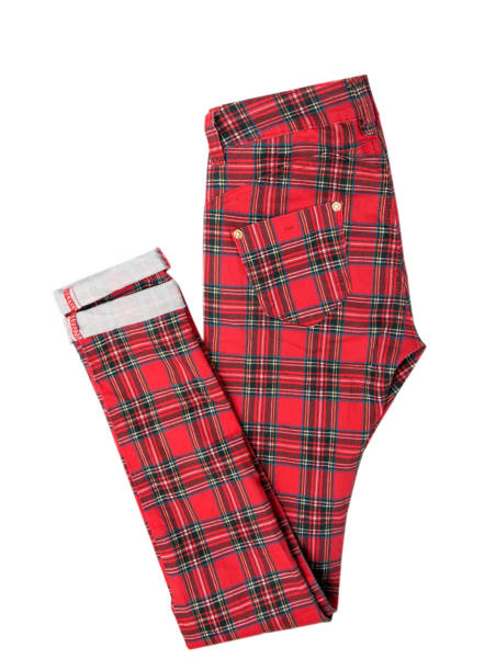 istock Female red trousers in a cage isolated on a white background 1169911083