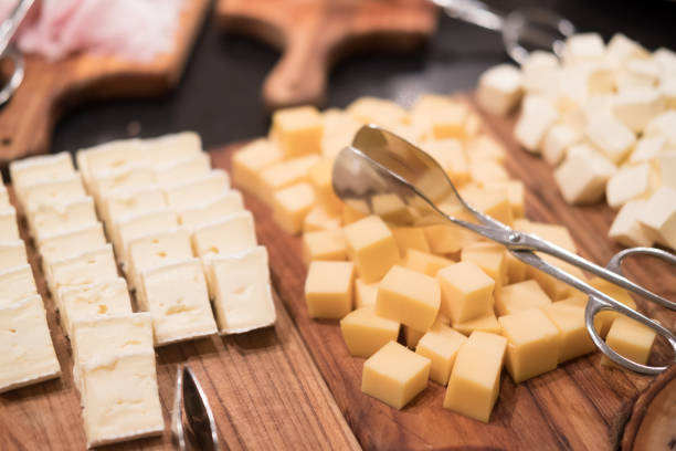 istock Catering service with a large assorted cheese Brie and Gouda cheese 1169911412
