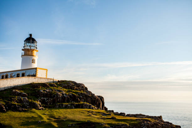 istock Neist Point lighthouse in Skye, Scotland 1169914942