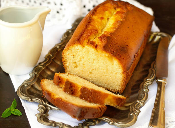 Sweet homemade traditional pound cake with lemon Sweet homemade traditional pound cake with lemon for dessert pound cake stock pictures, royalty-free photos & images