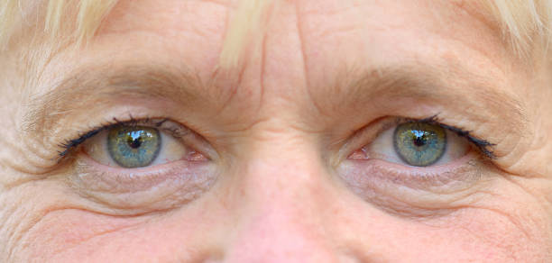istock Close-up portrait of a womans eyes 1169921532