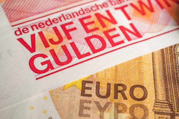 istock Euro and Guilders bill 1169921698
