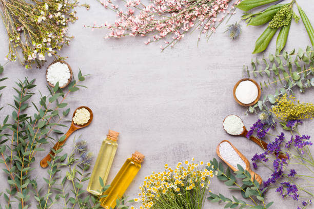 istock Beauty and aromatherapy concept with spa set on pastel rustic wooden background. 1169924054