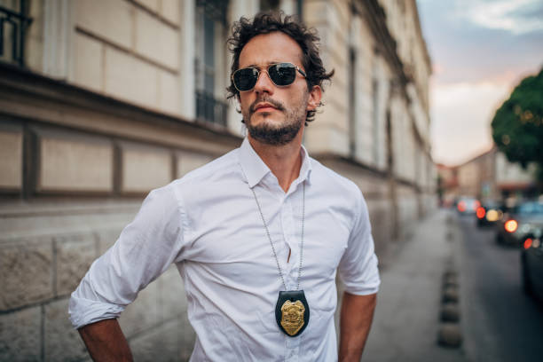 istock Charming detective on the street 1169925169