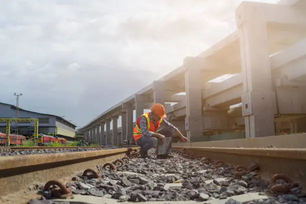 Photo of Worker checking track of  mass transit