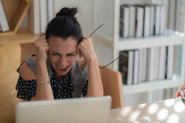 istock women check email on laptop 1169927695