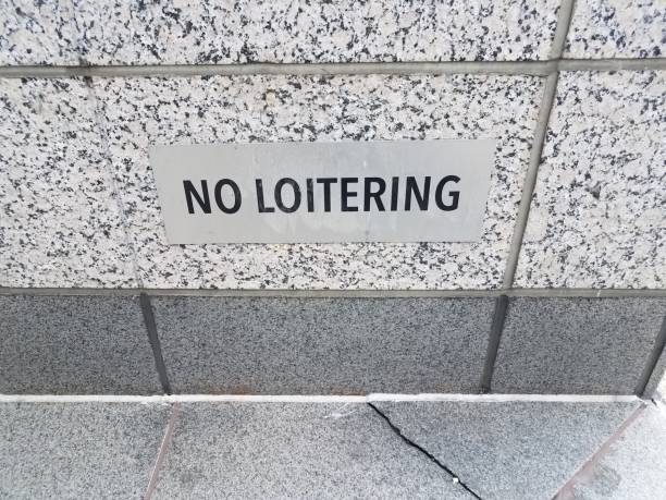 istock no loitering sign on black and white granite or marble wall 1169927747