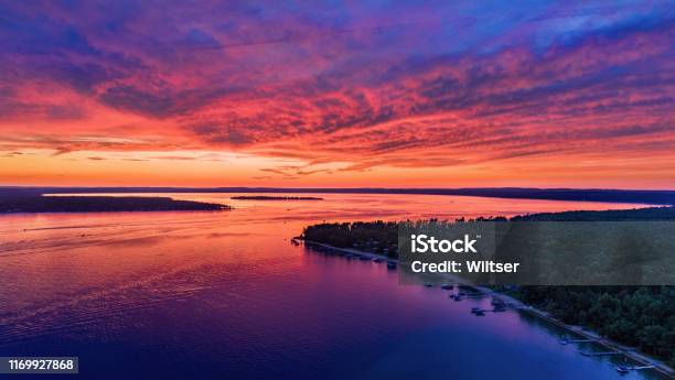 Flag Point Higgins Lake Fiery Sunset Stock Photo - Download Image Now - Sunset, Michigan, Sky