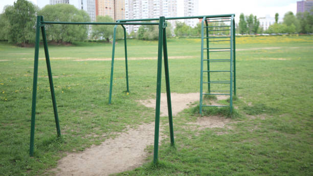 istock horizontal bar in city park 1169929107