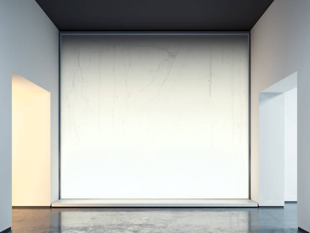 istock Illuminated blank white Canvas placard or billboard or wall in showroom, 3d rendering. 1169929336