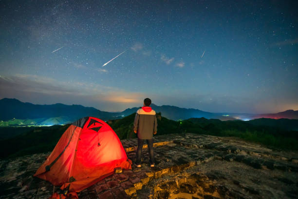 Watch the Perseid meteor shower in 2019 on the beacon tower of the Great Wall in China stock photo