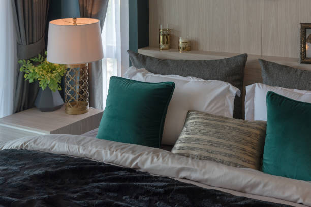 istock modern bedroom with set of pillows 1169932940